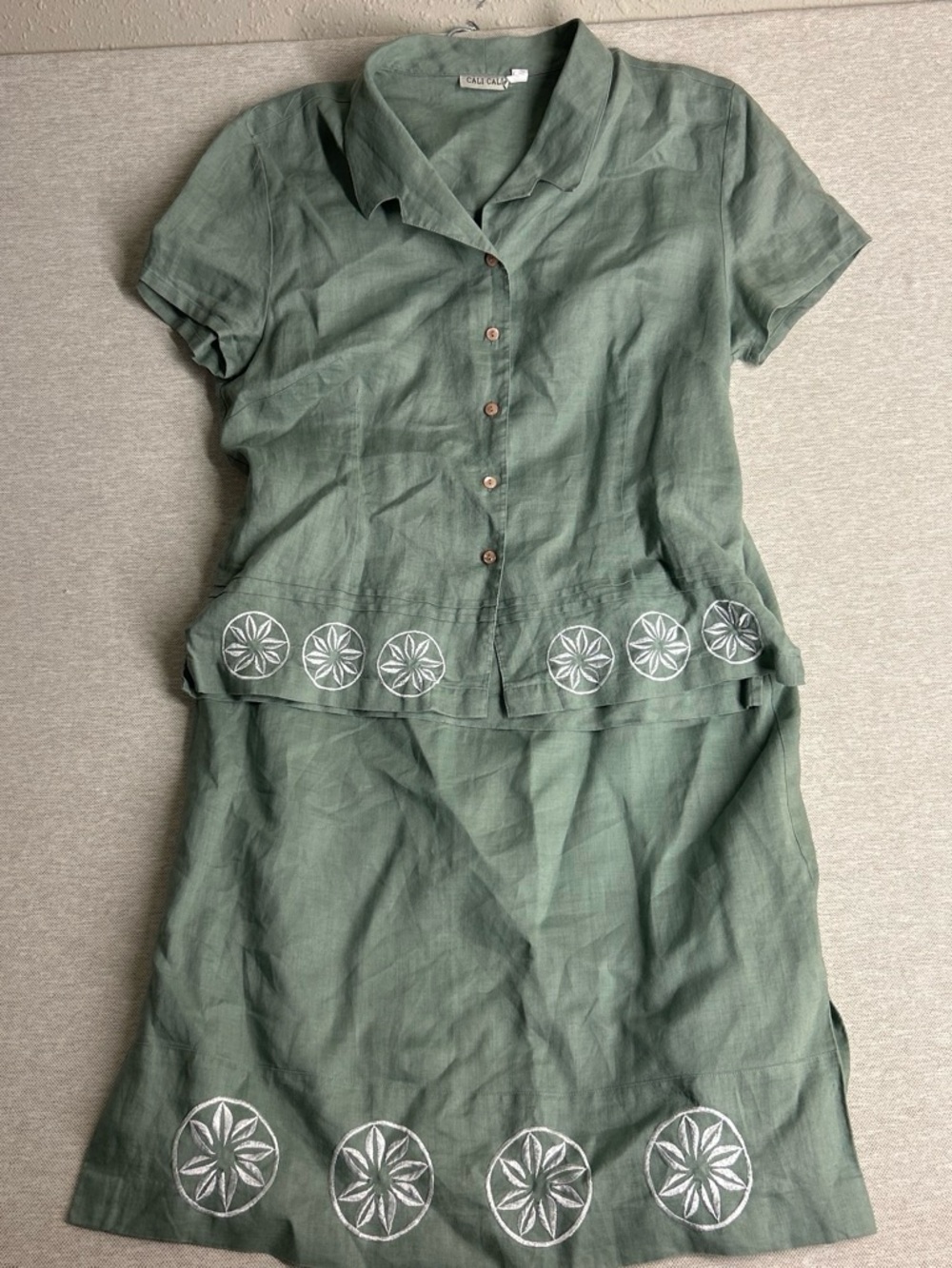 Green Linen Two-Piece Skirt Set with White Embroidered Medallions